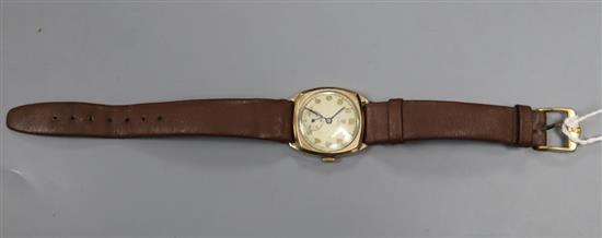 A gentlemans 1940s 9ct gold Tudor manual wind wrist watch, with case back inscription, on leather strap, gross 23.9 grams,